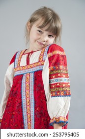 Little Girl In A Cunning Russian Folk Costume.
