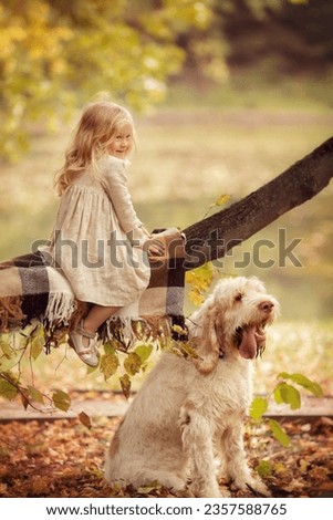 Similar – Foto Bild Mädchen mit Welpe am See