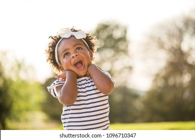 Little girl with a cute expression. - Shutterstock ID 1096710347