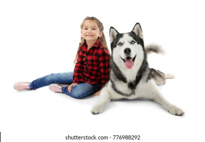 Little Girl With Cute Husky Dog On White Background