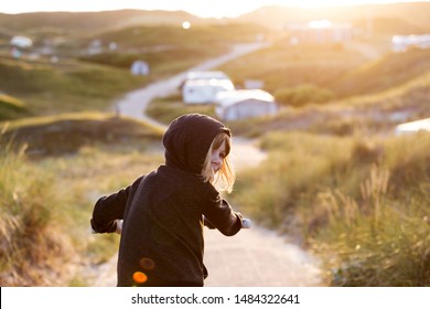 Little Girl Cycling In Campsite, Texel, Holland