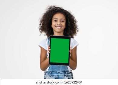 Little Girl With The Digital Tablet On White Background