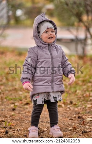 Similar – Image, Stock Photo Cute baby seeing falling leaves