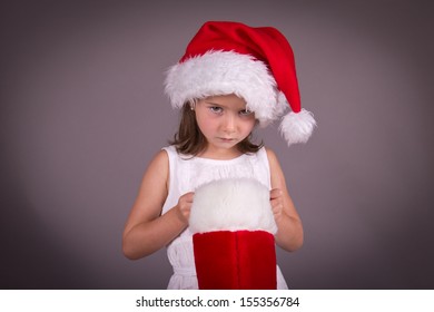 Little Girl Disappointed With Her Christmas Stocking