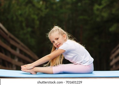 Little Girl Doing Fitness Outdoor Stock Photo 701601229 | Shutterstock