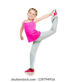 Little Girl Doing Gymnastics Over White Background