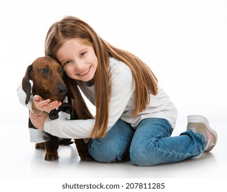 Little Girl With Dolittle Girl With A Dog Breed Dachshund Isolated On White Backgroundg