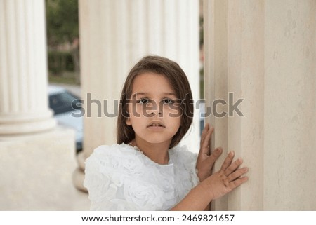 Image, Stock Photo Adorable little girl combed with pigtails