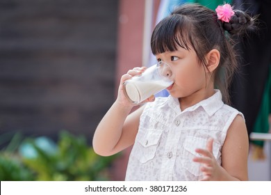 Little Girl Drinking Milk Home Soft Stock Photo (Edit Now) 380171236