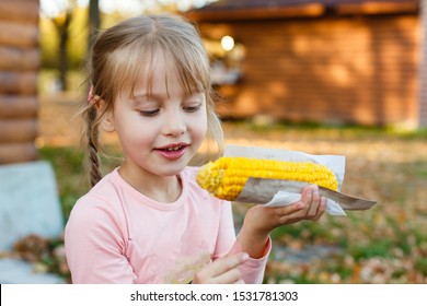 Little Girl Eating Messy Corn On Stock Photo 1531781303 | Shutterstock