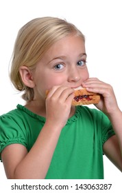 Little Girl Eating A Pbj Sandwich