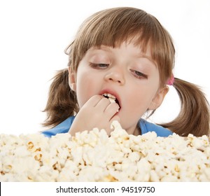 Little Girl Eating Popcorn