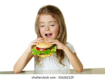 Little Girl Eating Sandwich.Child With Hamburger.Isolated On White Background.