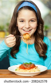 Little Girl Eating Spaghetti 