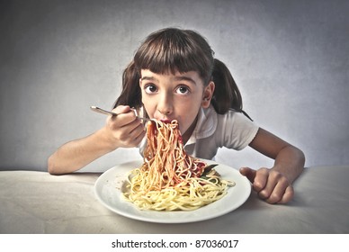 Little Girl Eating Spaghetti