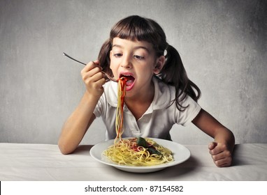 Little Girl Eating Spaghetti