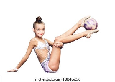 Little Girl Is Engaged In Rhythmic Gymnastics With Ball Isolated On White