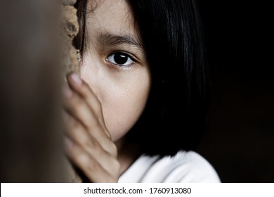 Little girl with eye sad and hopeless. Human trafficking and fear child concept.  - Shutterstock ID 1760913080