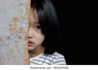 Little girl with eye sad and hopeless. Human trafficking and fear child concept.  - Shutterstock ID 1851047050
