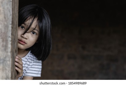 Little Girl With Eye Sad And Hopeless. Human Trafficking And Fear Child Concept. 