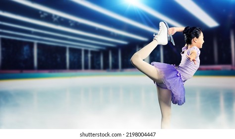 Little Girl Figure Skating On A Skating Rink. Figure Skating Competition. Ice Show.