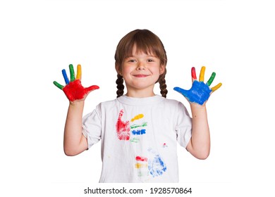 Little girl fun paints with colorful paints and gets her hands and her white T-shirt dirty isolated on white background. Playful art training. - Shutterstock ID 1928570864
