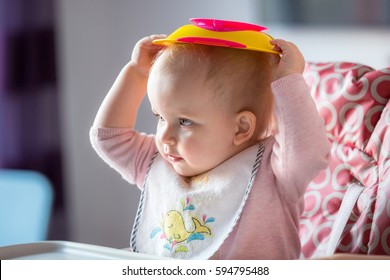 Little Girl Fussy Eater Sitting On The High Chair