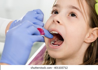 Little Girl Getting Dental Braces