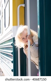 Little Girl Getting On The Train