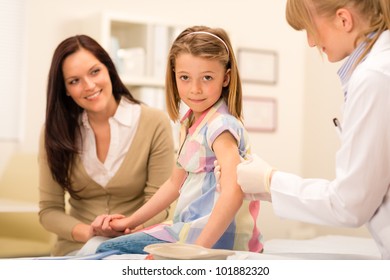 Little girl getting vaccination from pediatrician at office - Powered by Shutterstock