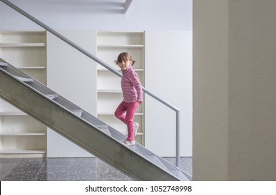 Little Girl Going Up The Stairs