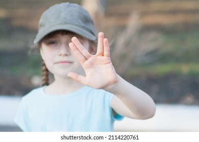 Little Girl Greets With Hand Like Spock.