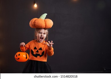 Little Girl Halloween Pumpkin Costume Scares Stock Photo 1514820518 ...