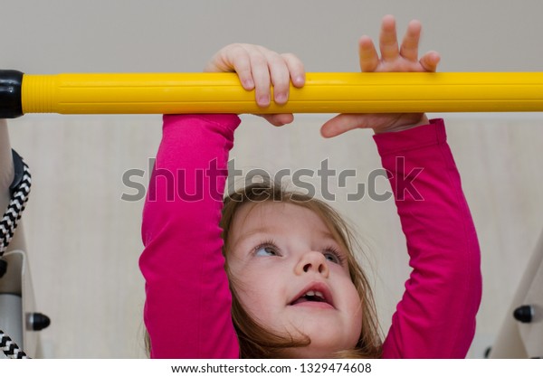 little girl hanged Girls Hanging from Tree Branch Stock Image - Image of active ...