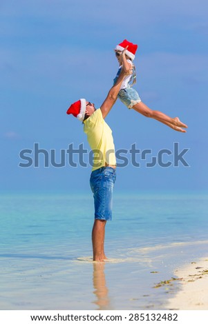 Similar – Image, Stock Photo Father and son playing superhero on the beach at the day time. People having fun outdoors. Concept of summer vacation and friendly family.