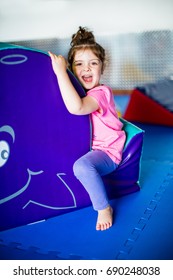 Little girl having fun at soft play  - Shutterstock ID 690248038