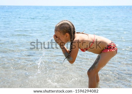 Similar – One happy little boy playing on the beach