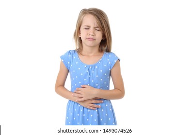 Little girl having stomach ache on white background - Powered by Shutterstock