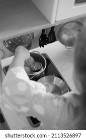 Little Girl Helps Mom Cook