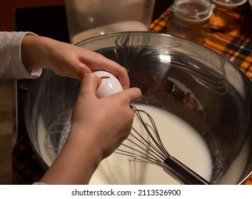 Little Girl Helps Mom Cook