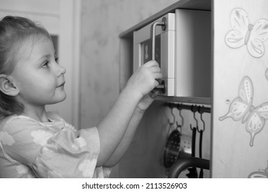 Little Girl Helps Mom Cook