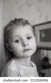 Little Girl Helps Mom Cook