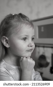 Little Girl Helps Mom Cook