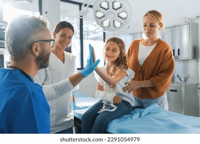 Little girl with her mother in surgery examination. - Powered by Shutterstock