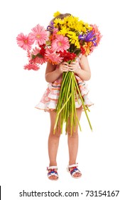 Little Girl Holding Bunch Of Flowers.