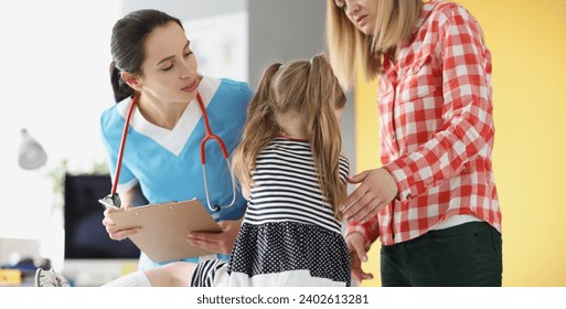 Little girl holding her neck at pediatrician doctor appointment. Diagnosis and treatment of myositis in children concept - Powered by Shutterstock