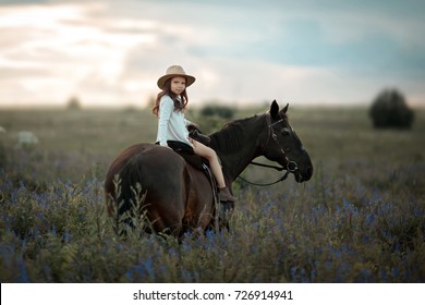 little girl with horse on ranch