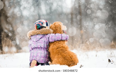 Little Girl Hugging Dog And Looks Forward