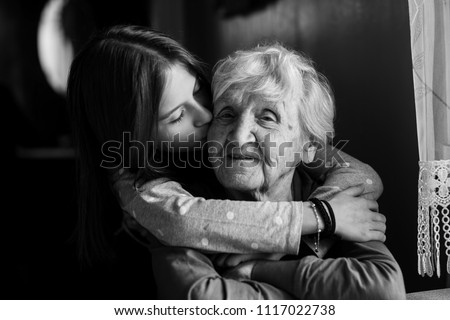 Similar – Senior woman in a wheelchair with daughter in garden