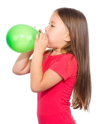 Little Girl Is Inflating Green Balloon, Isolated Over White